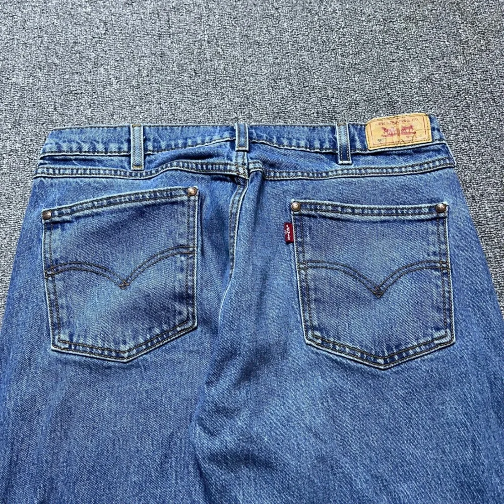 Levi's 557 Jeans 34x30 Blue Relaxed Boot Leg Denim Skater 90s Style